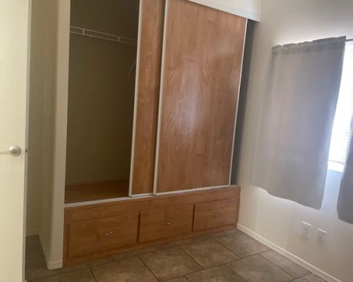 #134 Bedroom & sliding closet door,storage under