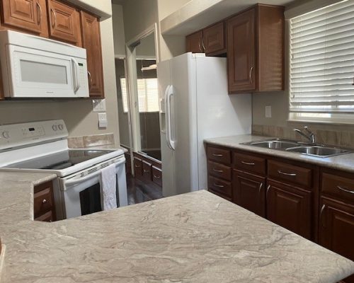 #261 Kitchen all electric, double sink,counter & cabinets