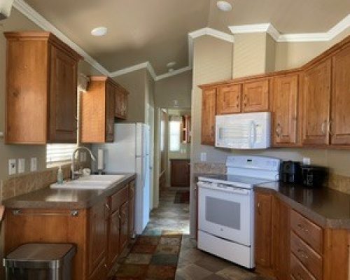 #266 Kitchen with white applancies & plenty of cupbroad storage